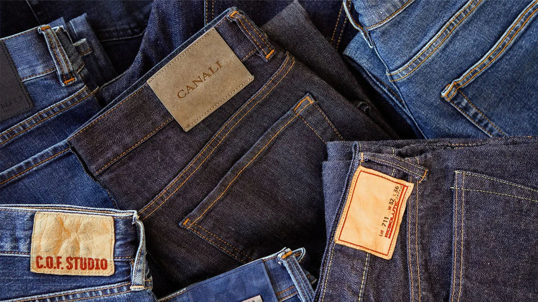 Assorted denim jeans with visible brand labels.