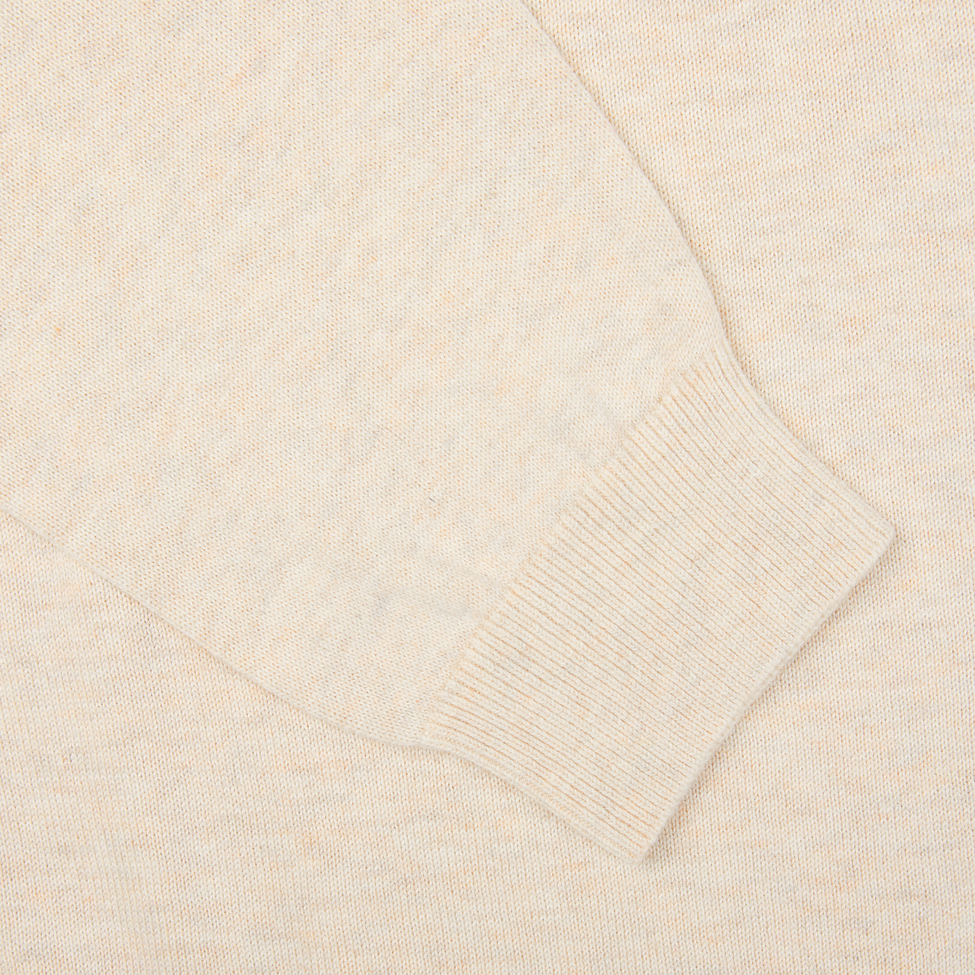 A close up of a Light Beige Luxury Cotton Crewneck Alan Paine sweater on a white surface.
