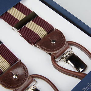 A pair of Albert Thurston Burgundy-Beige Striped Nylon 35mm Braces in a box, featuring a burgundy-beige striped pattern.