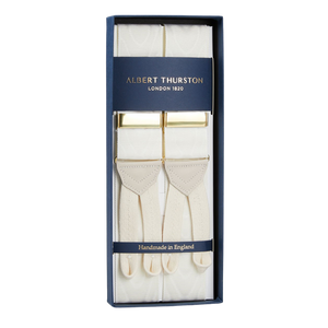 A pair of Cream Moiré 38 mm braces, also known as suspenders, in an Albert Thurston box perfect for a black-tie party.