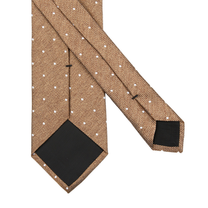 A Brown Dot Silk Lined Tie by Amanda Christensen on a white background.