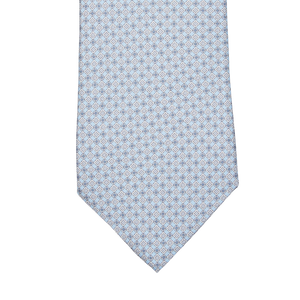 A Sky Blue Medallion Printed Silk Lined Tie by Amanda Christensen.