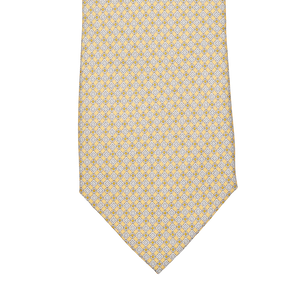 Sentence with product name and brand name: A Yellow Micro Medallion Printed Silk Lined Tie from Amanda Christensen.