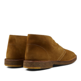 A pair of brown suede Astorflex desert boots.
