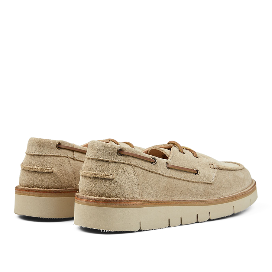 Pair of Astorflex Ecru Beige Suede Leather Boatflex Moccasins with rubber soles on a transparent background.