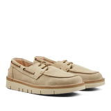 A pair of Ecru Beige Astorflex Suede Leather Boatflex Moccasins with white soles on a light background.