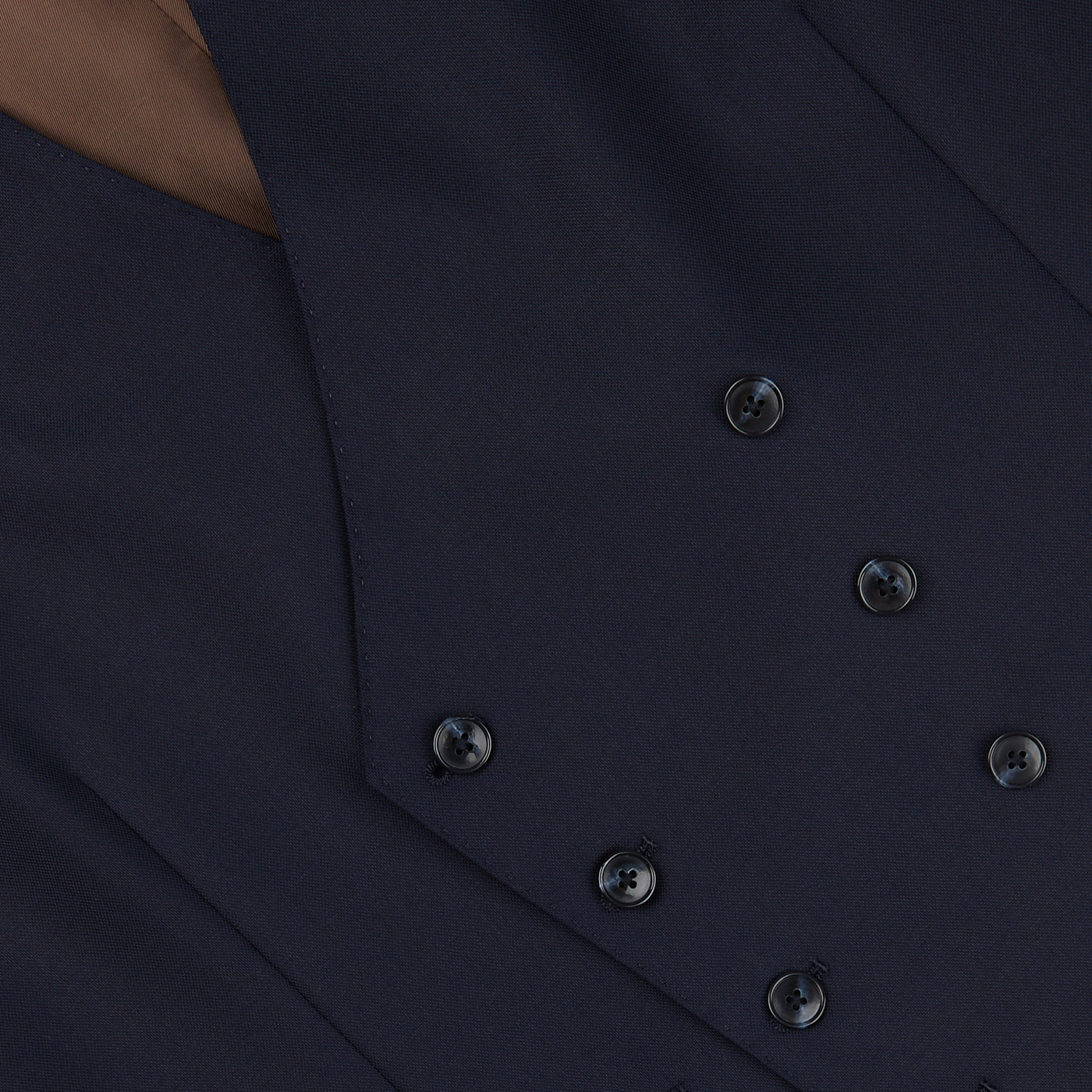 Close-up of a Baltzar Sartorial Navy Super 100s Wool DB Waistcoat with black buttons.