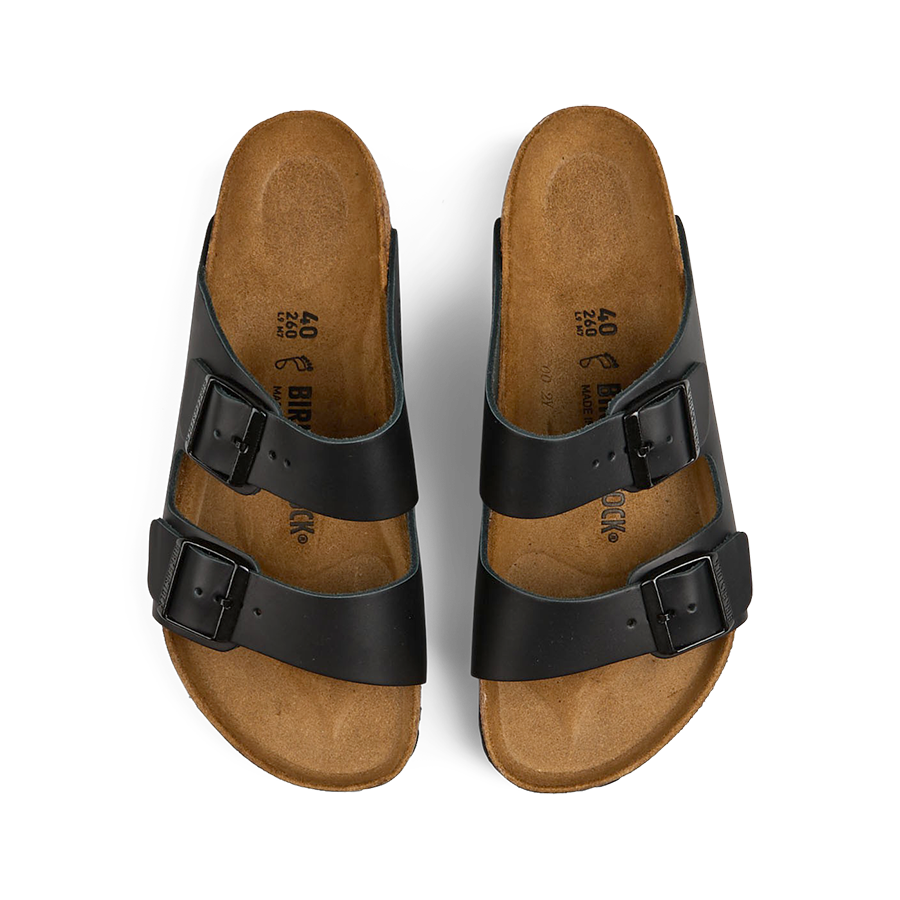 A pair of black Birkenstock Natural Leather Arizona sandals with adjustable straps and buckles, displayed on a white background.