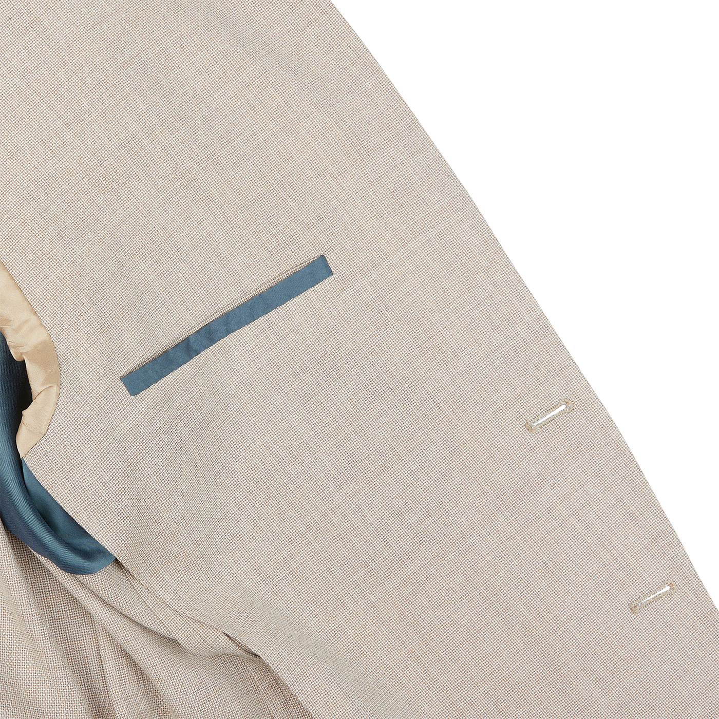 A close up of a Boglioli Cream Beige Wool Hopsack K Jacket suit with a blue pocket showcasing fine craftsmanship.