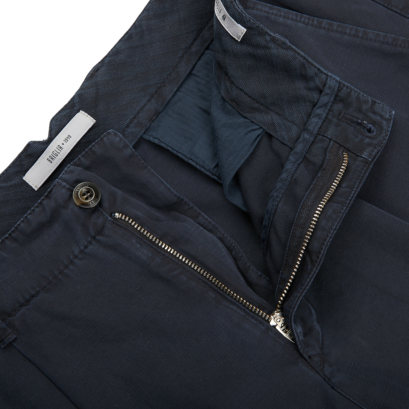 A pair of Navy Blue Cotton Linen BG59 Pleated Chinos with zippered pockets, made from an upcycled mix of cotton and linen. These Italian specialist Briglia pants are both stylish and functional.