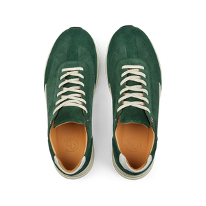 A pair of Court Green Suede Leather Renna Sneakers by CQP with white laces, viewed from above, featuring a VIBRAM sole.