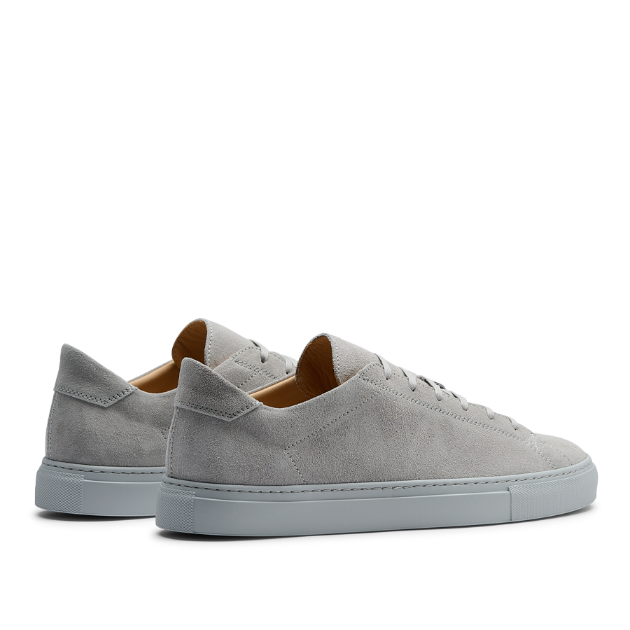 A pair of Steel Grey Suede Leather Racquet Sr Sneakers by CQP.
