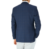 The back view of a man wearing a Canali Dark Blue Mini Gingham Wool Drop 6 Blazer.