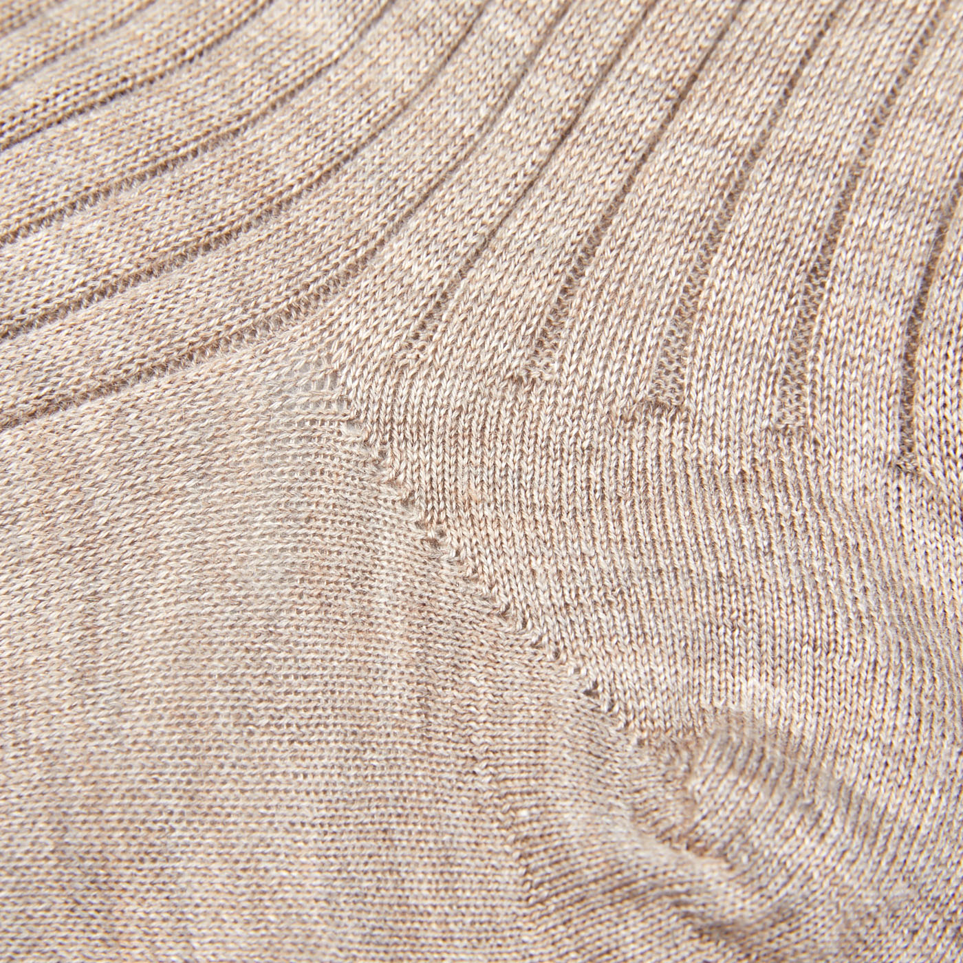 A close up of a pair of Canali Light Beige Cashmere Silk Ribbed Socks.