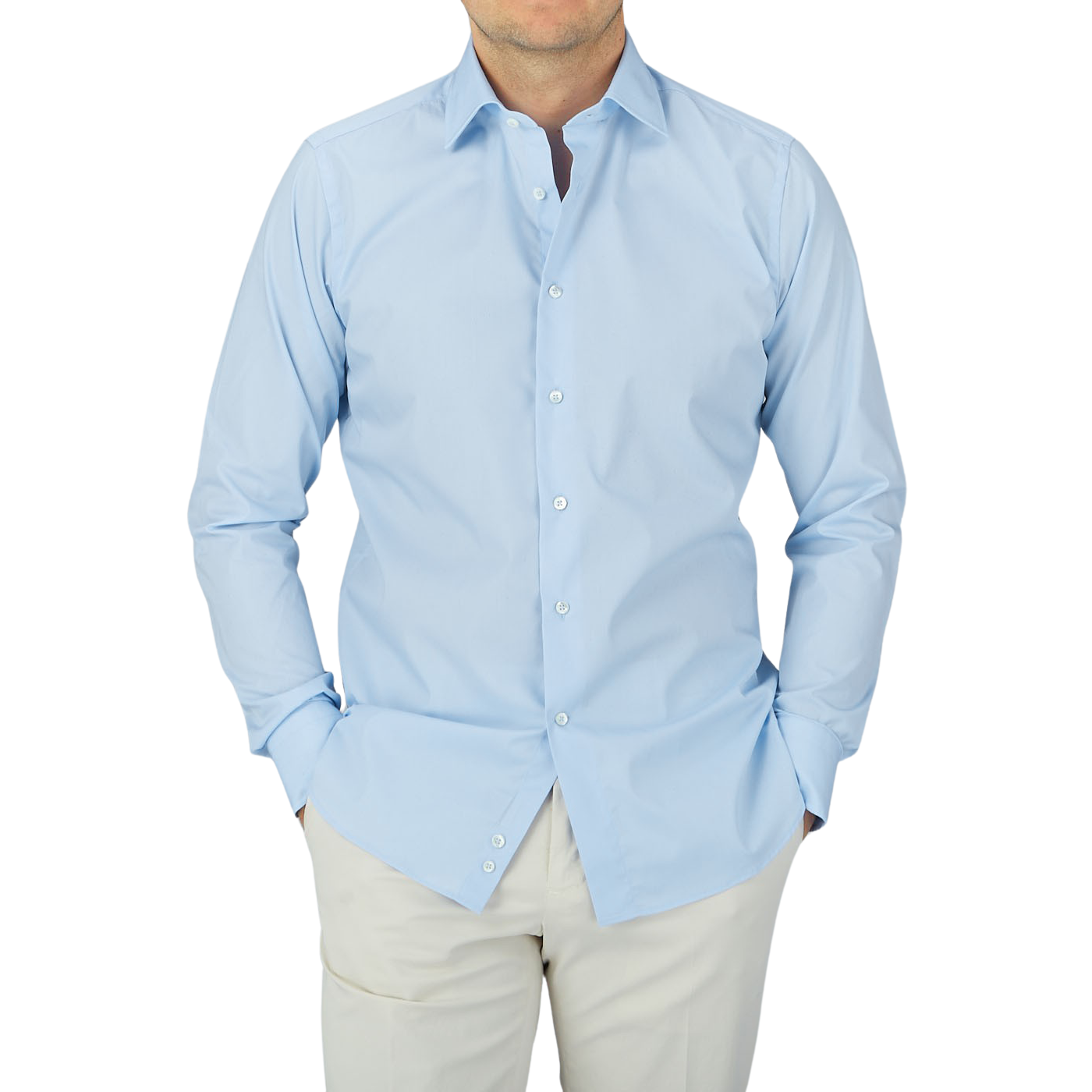 A man wearing a Canali Plain Blue Cotton Poplin Single Cuff Shirt.