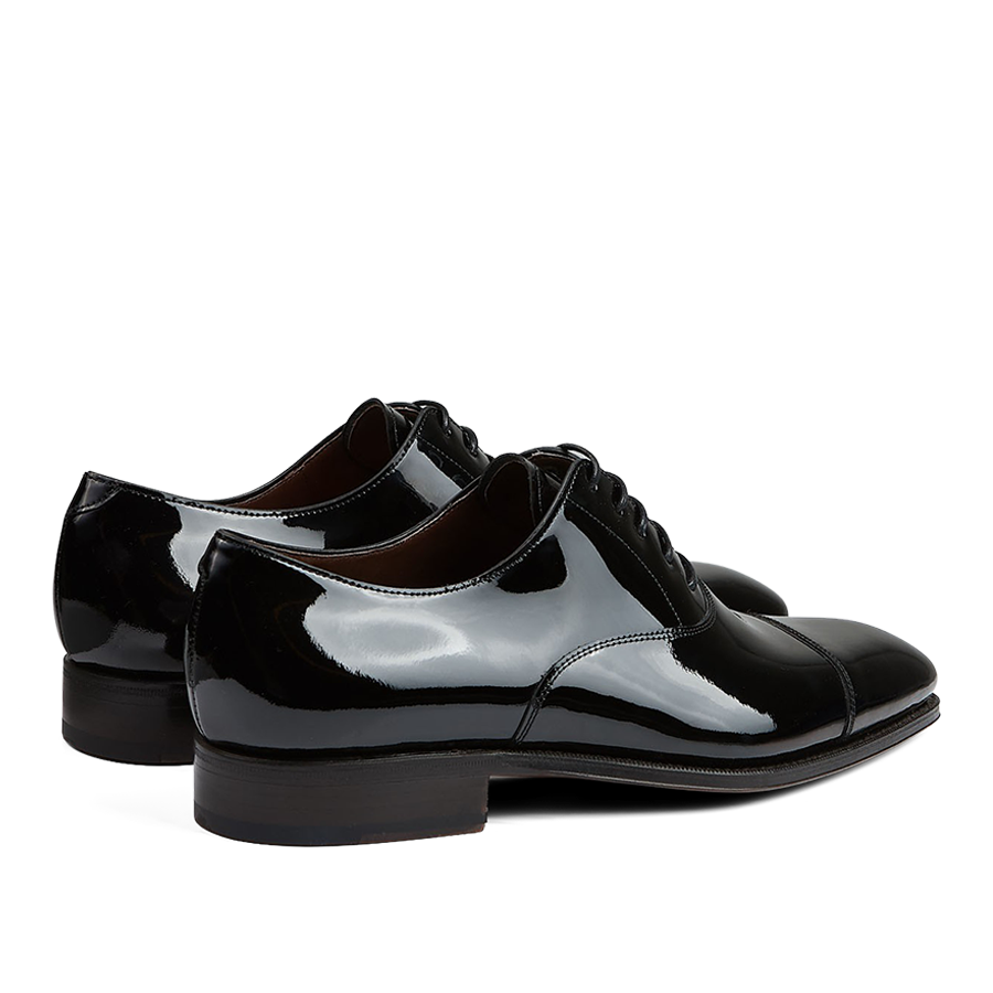 A pair of black Carmina Rain Patent Leather Oxford Shoes.
