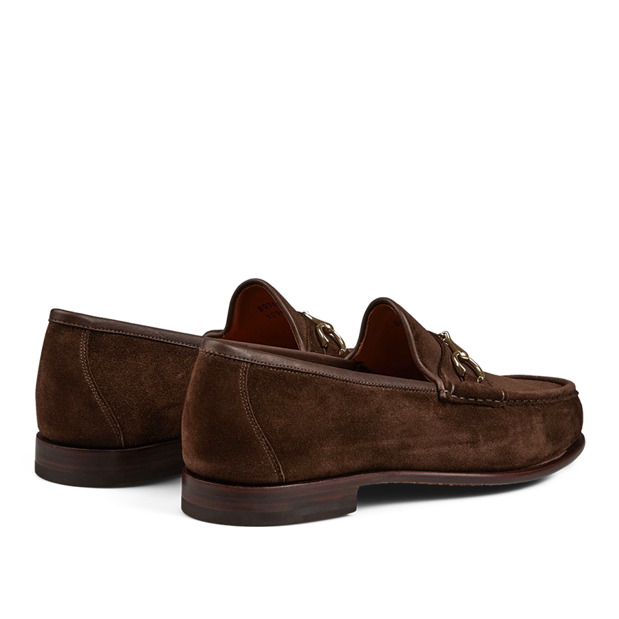 A pair of chocolate suede leather Xim horsebit loafers with metal buckle detail from Carmina.