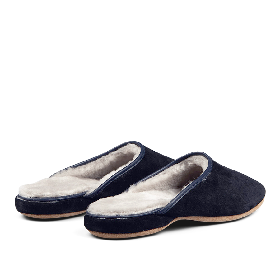 A pair of Navy Blue Suede Sheepskin Open Slippers by Derek Rose with handmade white fur lining.