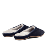 A pair of Navy Blue Suede Sheepskin Open Slippers by Derek Rose with handmade white fur lining.