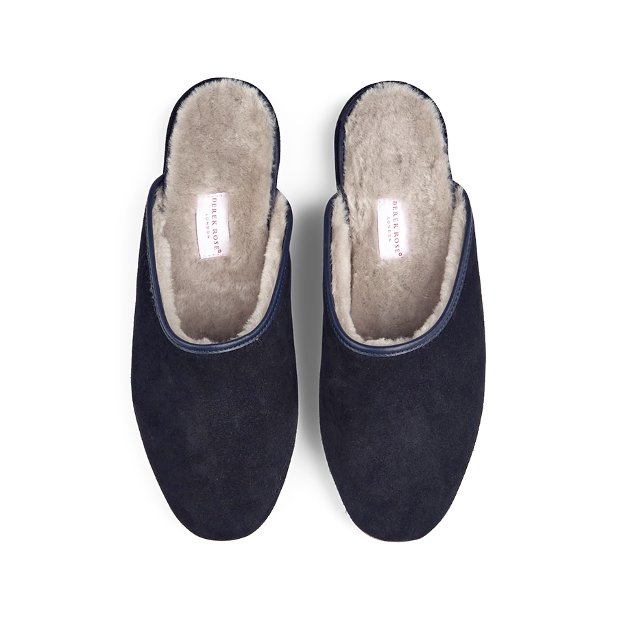 A pair of Derek Rose navy blue suede sheepskin open slippers.