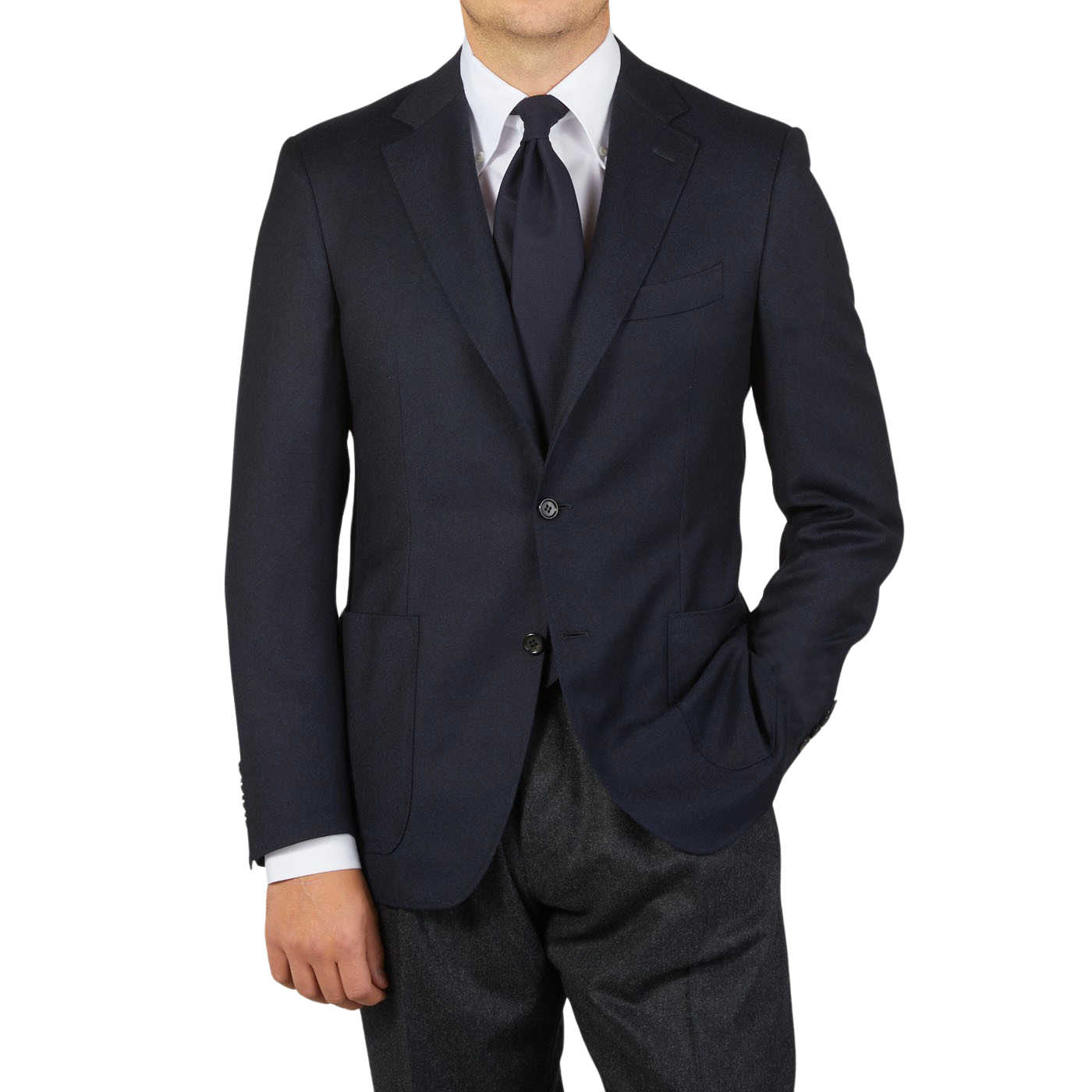 A man is posing for a photo in a Dreaming Of Monday Navy Blue 7-Fold Super 100s Wool Tie.
