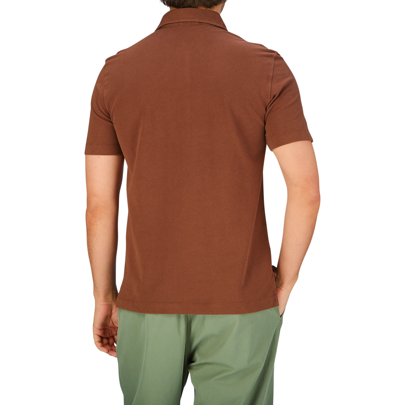 Man viewed from behind wearing a brown Drumohr Coffee Brown Cotton Piquet Polo Shirt and green trousers.