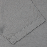 A close up of a Steel Grey Cotton Linen T-Shirt from Drumohr in Italy.