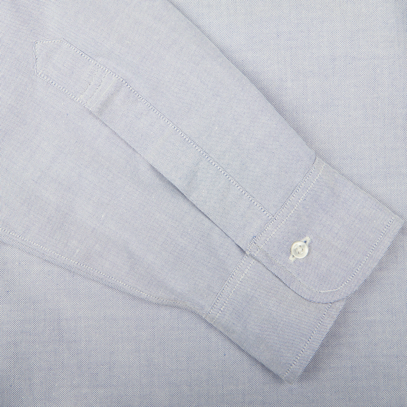 A close up of a Light Blue Cotton Oxford BD Regular Shirt made by Far East Manufacturing.