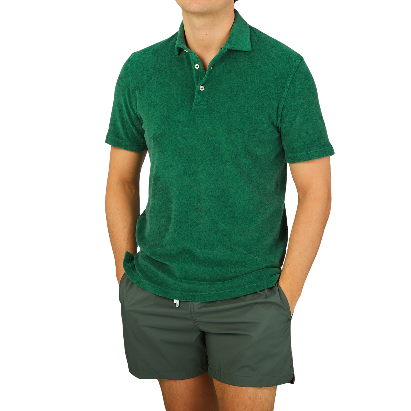 Baltzar, wearing a Fedeli Grass Green Cotton Towelling Polo Shirt and shorts.