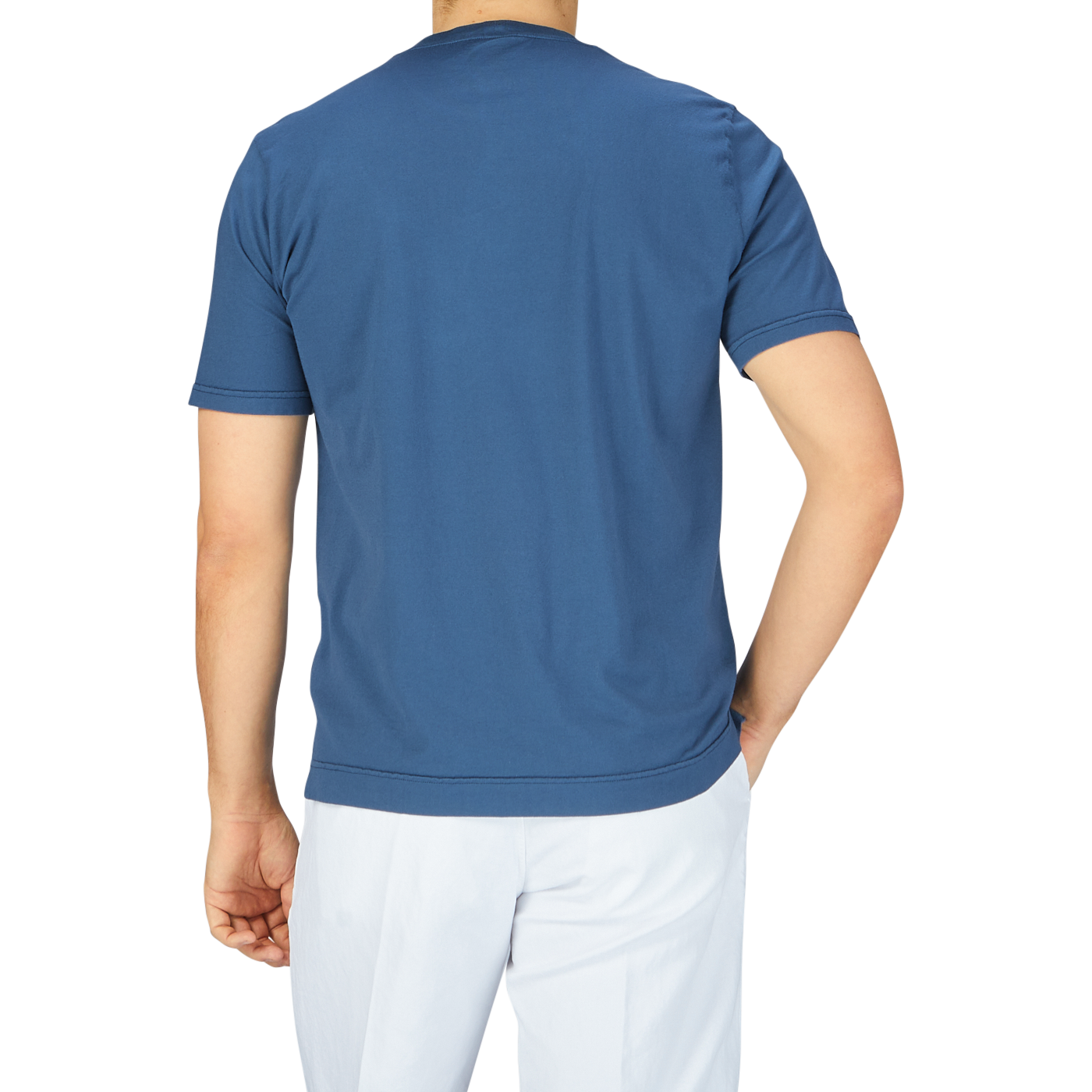 The back view of a man wearing a Fedeli Indigo Blue Organic Cotton T-Shirt.