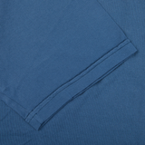 A close up of a luxury Fedeli Indigo Blue Organic Cotton T-shirt.