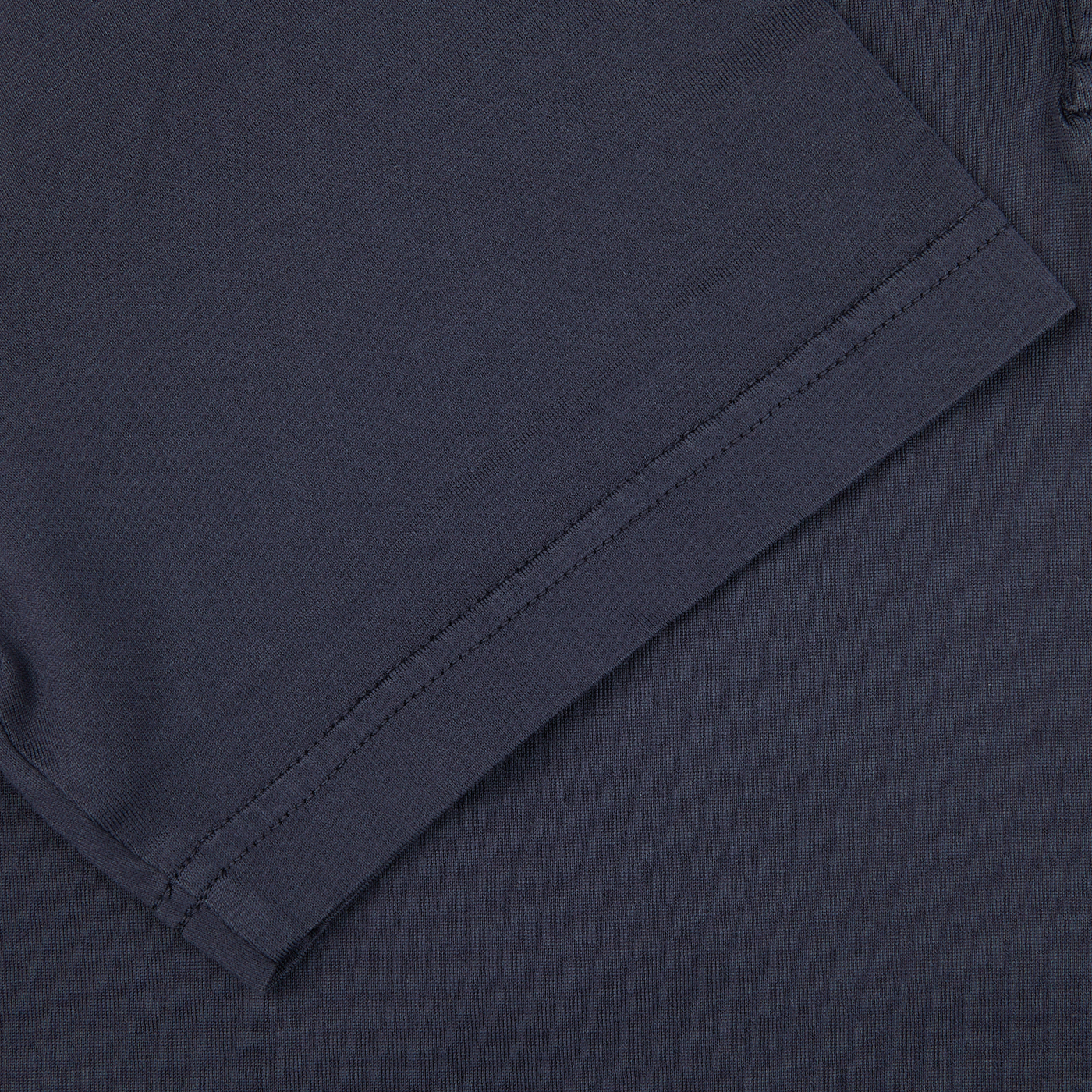 A close up of a Fedeli Navy Blue Organic Cotton Polo Shirt.