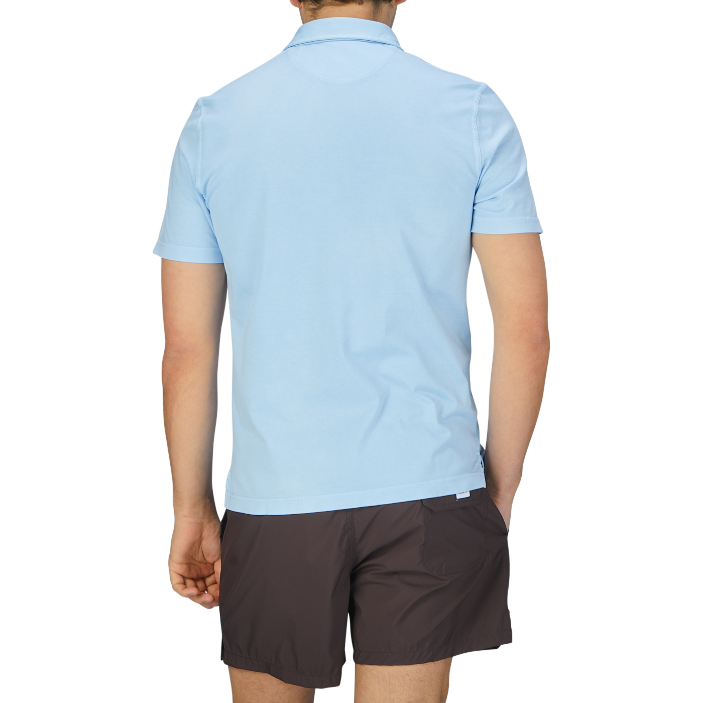 The back view of a man wearing a luxury Sky Blue Organic Cotton Polo Shirt by Fedeli.
