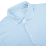 A close up of a Fedeli Sky Blue Organic Cotton Polo Shirt.