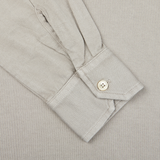 A close up of a Fedeli Taupe Beige Organic Cotton LS Polo Shirt with buttons.