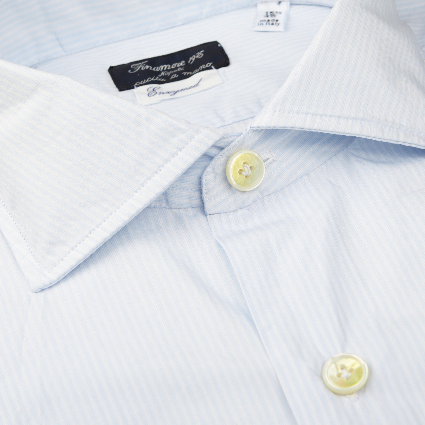 A close up of a slim fit Washed Light Blue Striped Cotton Shirt handmade by Finamore.