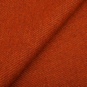 A close up image of a Burnt Sienna Merino Wool Cashmere Scarf by Fox Brothers.