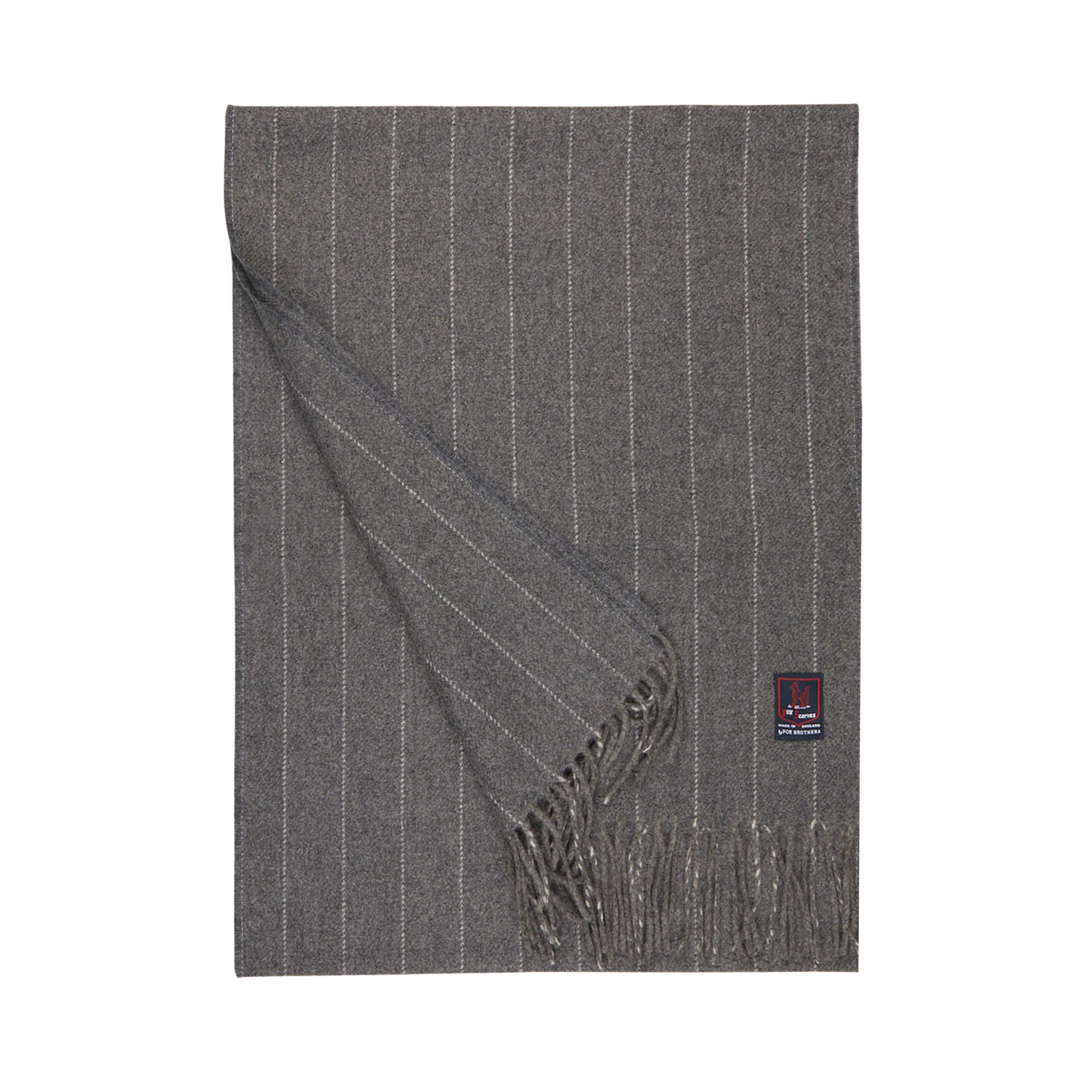 A Grey Chalkstripe Merino Wool Cashmere Scarf with fringed endings and a grey chalk stripe on a white background by Fox Brothers.