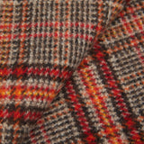 Description: A close up image of a Fox Brothers Negroni Checked Lambswool Cashmere Scarf.