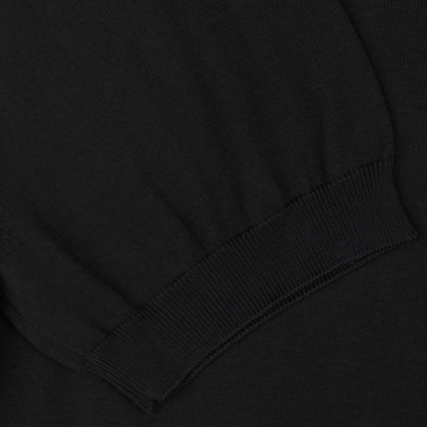 Close-up of a Gran Sasso black organic cotton t-shirt with ribbed detailing.