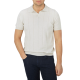A man wearing a Gran Sasso Cream Cotton Capri Collar Polo Shirt.