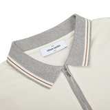 A Cream Beige Filo Scozia Zip Polo Shirt with a grey collar and by Gran Sasso.