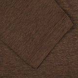 A close up of the Gran Sasso Dark Brown Knitted Linen LS Polo Shirt.
