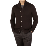 A man wearing a Gran Sasso Dark Brown Merino Wool Button Cardigan.