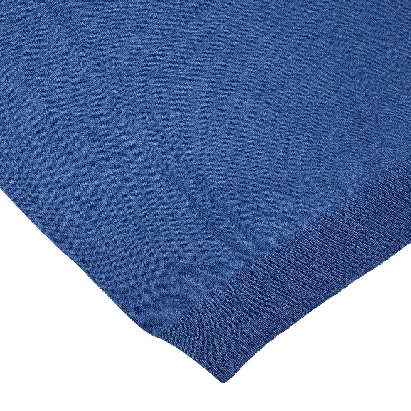 A close up of a Indigo Blue Vintage Merino Wool 1/4 Zip Sweater bed sheet by Gran Sasso.