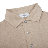 A Light Beige Merino Wool One-Piece Collar Polo Shirt with buttons on the collar, made by Gran Sasso.