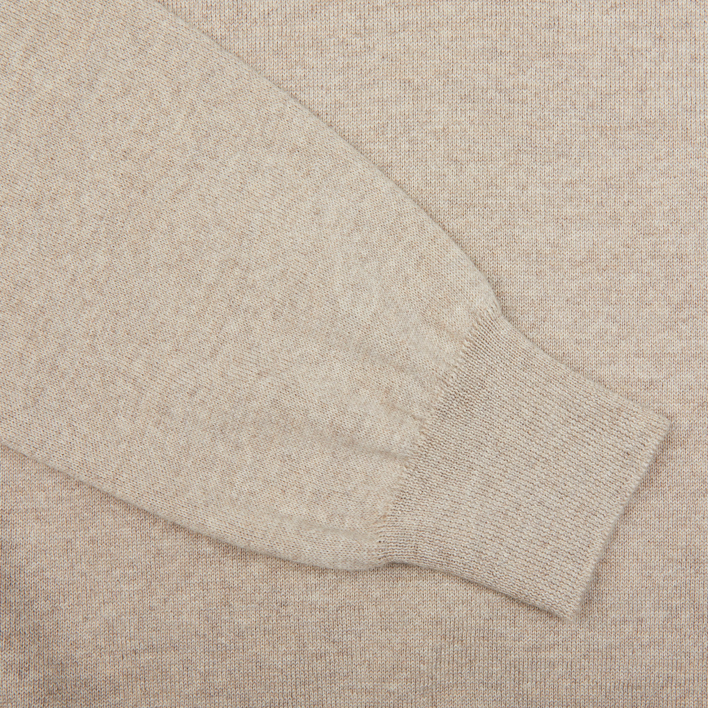 A close up of a Light Beige Merino Wool One-Piece Collar Polo Shirt, designed by Gran Sasso.