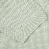 A close up image of a Light Green Cotton Linen Polo Shirt by Gran Sasso.