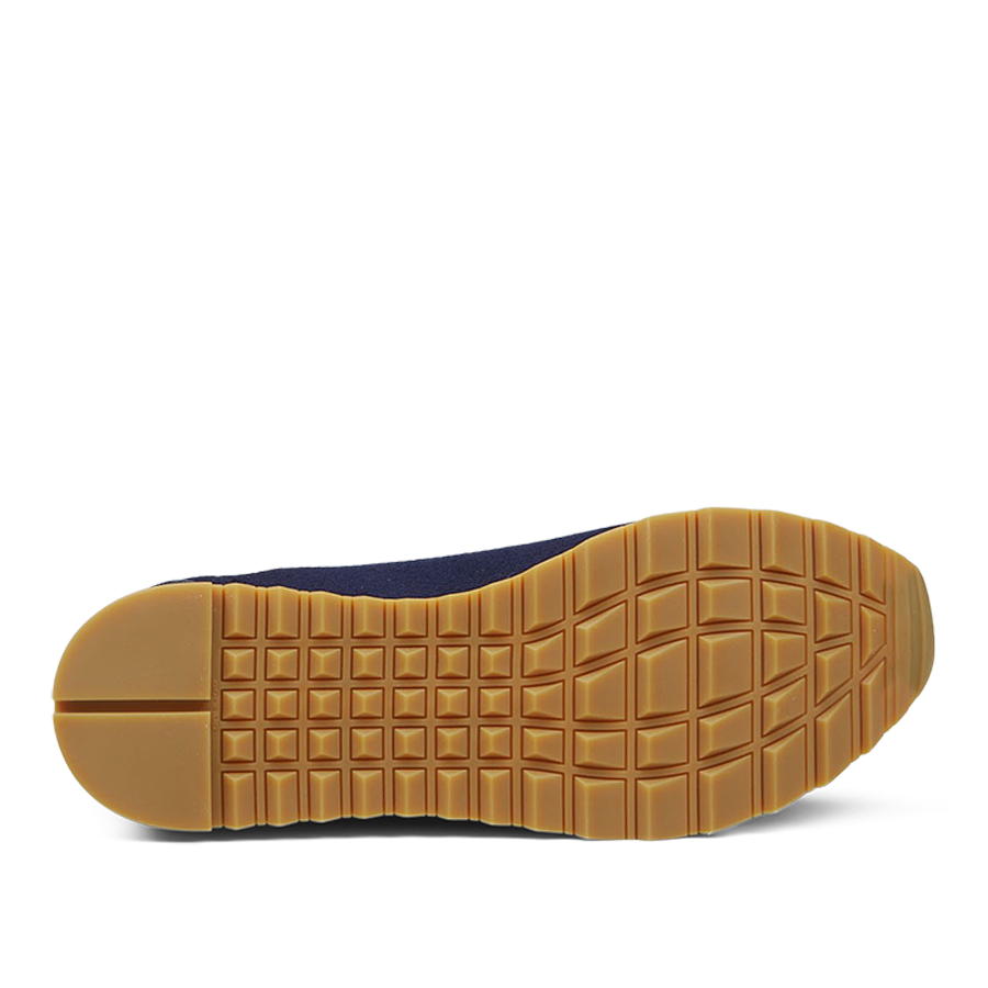 Close-up of a Gran Sasso navy blue gum rubber shoe sole with waffle tread pattern.