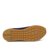 Close-up of a Gran Sasso navy blue gum rubber shoe sole with waffle tread pattern.